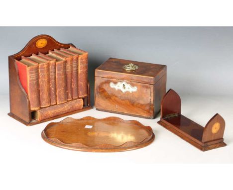 An Edwardian mahogany table-top bookcase, width 21cm, together with a sliding bookrack, an oval tray and a George III mahogan