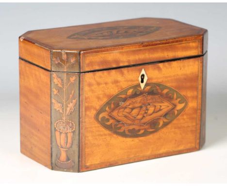 A George III satinwood canted rectangular tea caddy, inlaid with two shell paterae and panels of flowers, width 20cm.