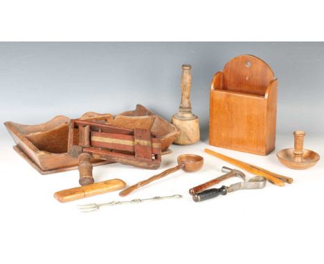 A mixed group of treen, including a cutlery tray, a clapper and a softwood ladle.