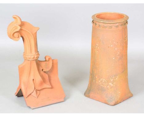 A late Victorian terracotta roof ridge finial of scroll form by W. Meeds &amp; Son, Burgess Hill, Sussex, height 66cm, togeth