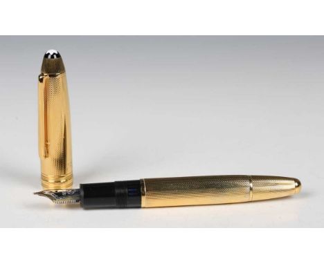 A Montblanc Meisterstück No. 146 silver gilt fountain pen, the nib detailed '4810 18K Montblanc', length 14cm.