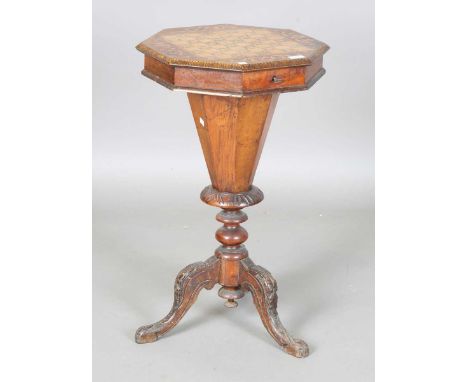 A late Victorian walnut work table, the hinged top inlaid with a chessboard,  on carved cabriole legs, height 74cm, width 48c