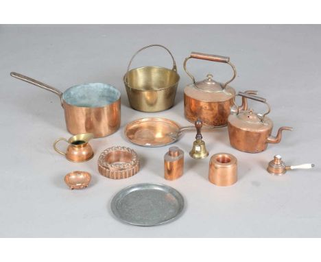 A group of mainly Victorian copperware, including two jelly moulds, two kettles, a tea caddy and a preserve pan.