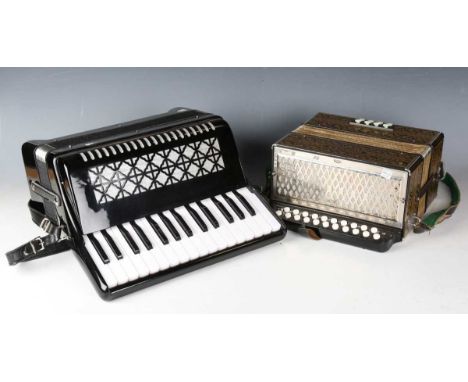 A Hohner accordion and a modern black cased piano accordion.