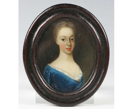 British School - an 18th century watercolour portrait miniature on ivory depicting a lady wearing a blue dress, 6.5cm x 5cm, 