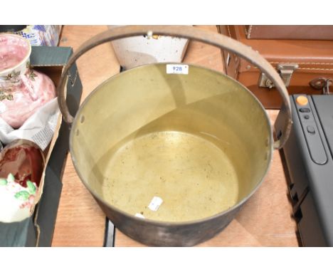 A brass and cast vintage jam pan