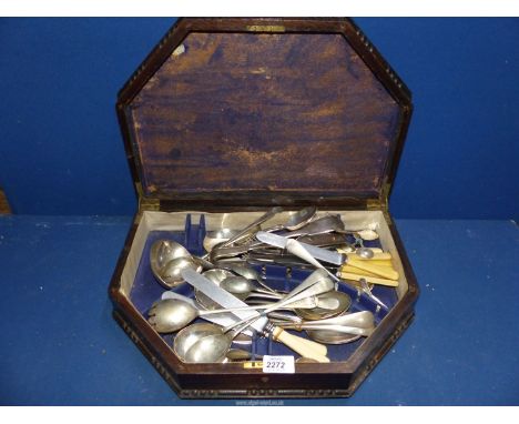 A darkwood cutlery box and contents of miscellaneous plated cutlery including ladle, knives, forks, etc., the lid having a pr