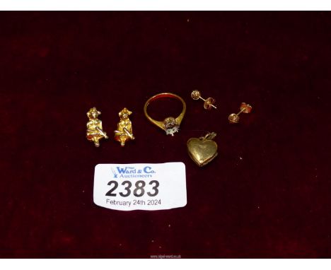 A small quantity of jewellery including an 18ct gold ring, stone missing, pair of 9ct gold knot studs, rolled gold heart lock