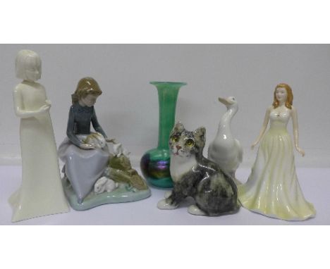 A Royal Doulton figure, June, Pearl, from the Gemstone Collection, a Royal Worcester figure, two Nao figures, a M'dina glass 