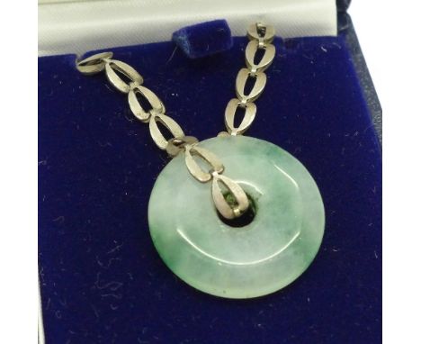 A jade pendant on a 925 silver chain