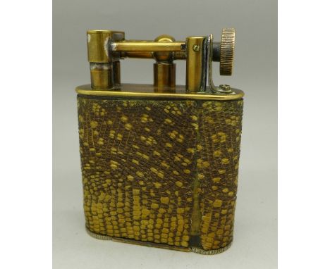 A snakeskin table lighter