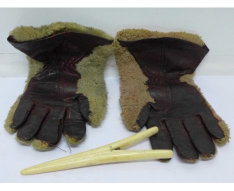 A pair of WWI flying gloves marked Bryan's Gloves, Worcester and a pair of glove stretchers