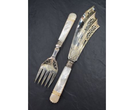 A late Victorian cased silver-mounted fish serving set, comprising fish slice and serving fork, each having mother-of-pearl h