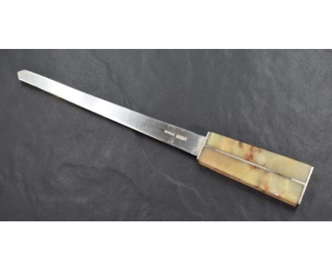 An Elizabeth II silver and green onyx letter opener, the blunt silver blade with a geometric onyx set handle, marks for Londo
