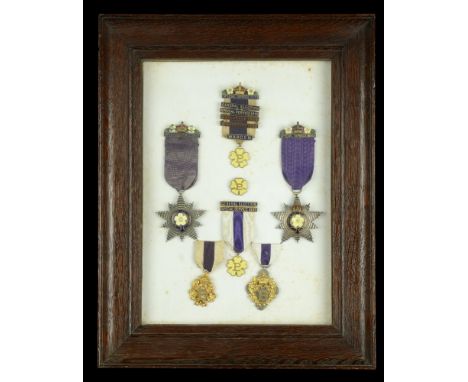 A selection of Primrose League badges, comprising two Honourable Order of the Grand Star badges, the first with ‘Special Serv