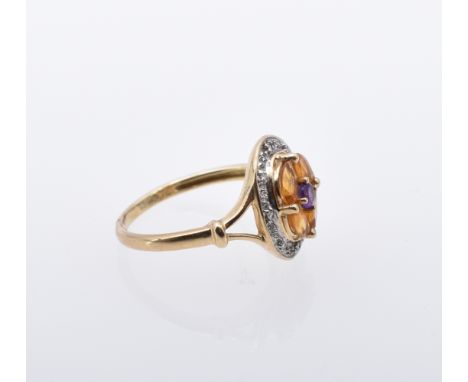 Citrin-Amethyst-Goldring 2. H. 20. Jh. Glatte, an der Schulter sich spaltende Schiene, ovale Schauseite mit vier navetteförmi
