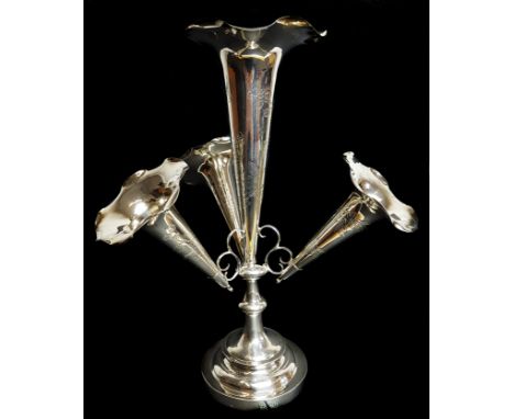 Wang Hing - A Chinese export silver table epergne, three smaller flutes arranged about a central single flute, on a stepped c