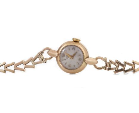 LONGINES NINE CARAT GOLD MANUAL WIND WRIST WATCH the round cream dial with Arabic and baton hour markers, 17mm case, on an op