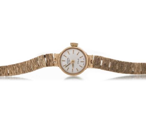 ROTARY NINE CARAT GOLD MANUAL WIND WRIST WATCH  the round cream dial with baton hour markers, 15mm case, on a nine carat gold