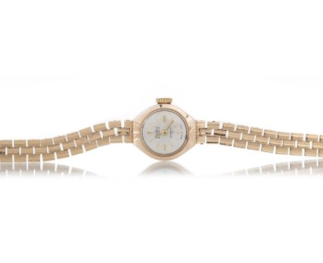BENTIMA NINE CARAT GOLD MANUAL WIND WRIST WATCH the round dial with baton hour markers, 15mm case, on a nine carat gold brace