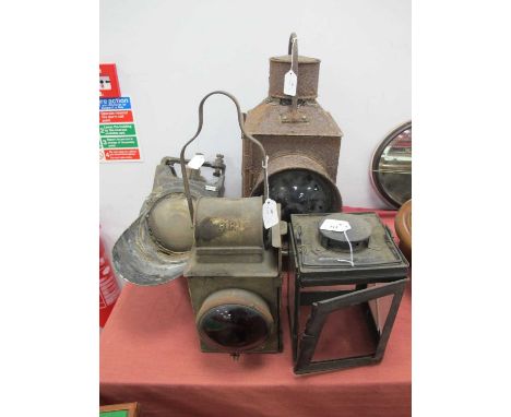 Four Railway Lights/Lamps, in poor condition, comprising a signal light (heavy corrosion), a railway crossing lamp/heavy corr