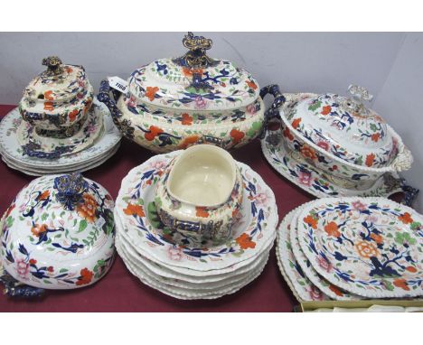 A XIX Century Ironstone China Dinner Ware, or approximately twenty pieces in the Imari palette including tureens (restoration