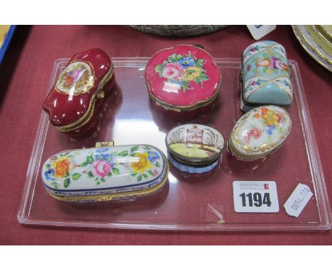 An Oval Enamel Patchbox with bird cage to mirrored lid, three Lioges example,s two others.
