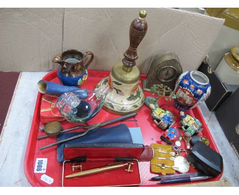 A Brass Arch Cased Mantle Clock, 12.5cm high, bell, ashtray, Oriental jar, Fero watch, etc:- One Tray.