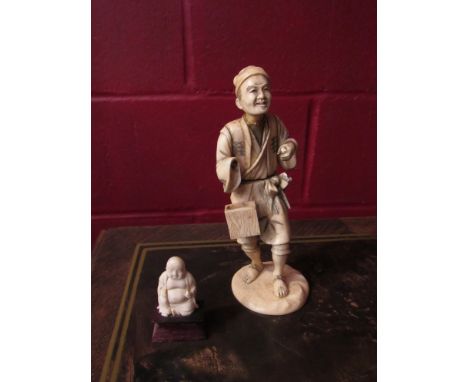 A gilt figural candlestick as a knight and two ivory figures, one a/f 