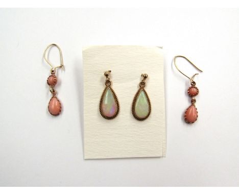 A pair of opal drop earrings and a pair of coral drop earrings 