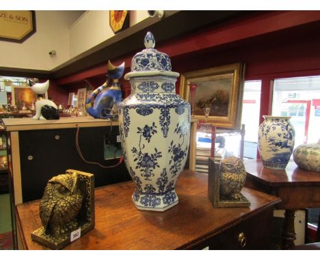 An Oriental ceramic lidded vase, blue and white foliate pattern