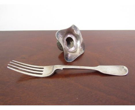 A Victorian silver fork and silver candlestick top  (2)