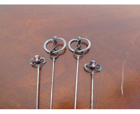 Two pairs of Charles Horner silver hat pins, one pair marked Chester 1911, the other sterling 18.5cm long and 16.5cm long