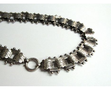 A Victorian white metal engraved panel necklace with ball detail 