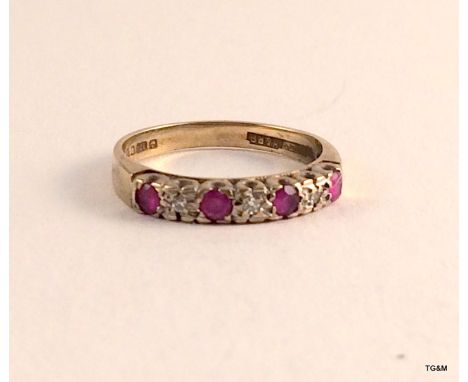 A 9ct gold ruby and diamond 1/2 eternity ring size k