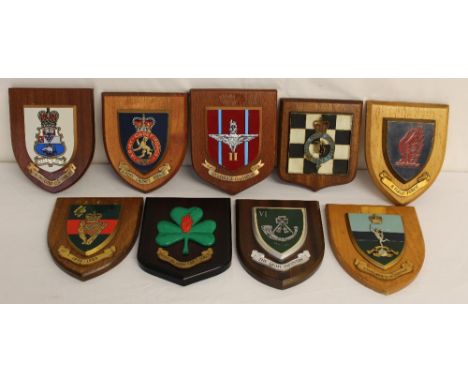 Nine military badges mounted on wooden shields to the No5 Field Force - Corps of Signals - Light Infantry - Royal Horse Artil