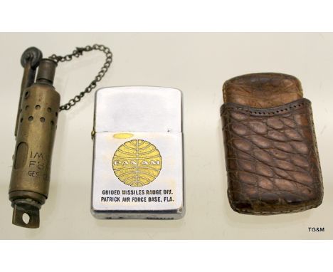 2 vintage lighters and leather Vesta