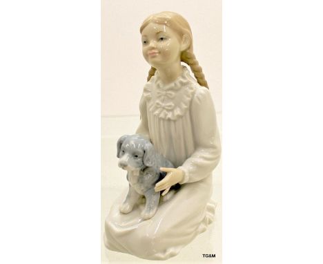 A Nao figure of a little girl with puppy. 20cm high