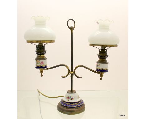 A French hand painted porcelain lamp originally a gas lamp
