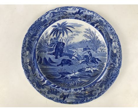 An early 19th century Spode blue-and-white Death to the Bear pattern plate, 25 cm diameter