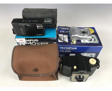 Two boxed Olympus cameras including a digital compact FE-210 AF-10 Super Outfit, together with a cased Kodak Brownie camera