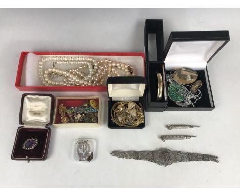 Costume jewellery, including a white-metal filigree bracelet, a boxed Zarifeh magnetic bangle, and two propelling-pencil fobs
