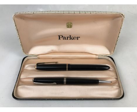 A vintage Parker fountain pen with case together with a propelling pencil