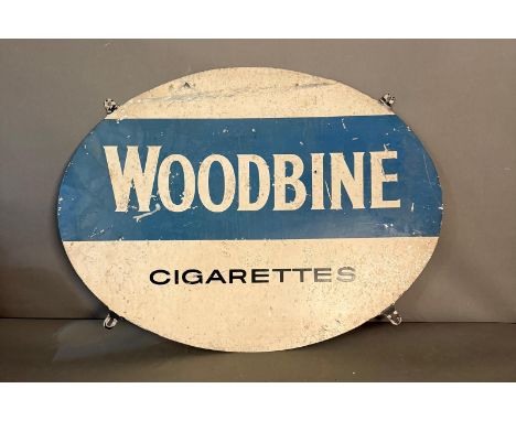 A vintage metal and enamel Woodbine cigarette sign 