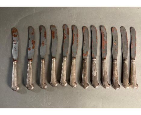 A set of Victorian silver handled pistol gripped knives retailed by Garrad. Handles hallmarked for London 1888 by Francis Hig
