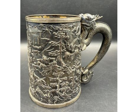 A 19th Century silver Chinese Export Beer tankard with dragon handle and warrior themed engraving, hallmarks to base, approxi
