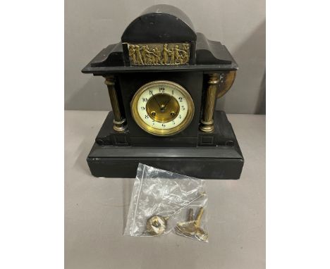 A Victorian slate mantel clock 