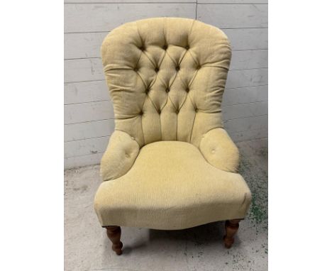A Victorian curved button nursing chair 