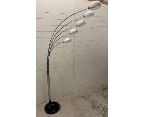 A chrome and white five arm floor lamp on a black marble effect base H200cm