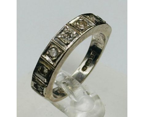 An 18ct white gold and diamond half eternity style ring, approximate style N and weight 6.3g
